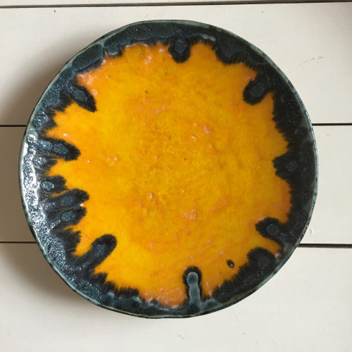 Yellow large ceramic fruit bowl with retro lava edge detail