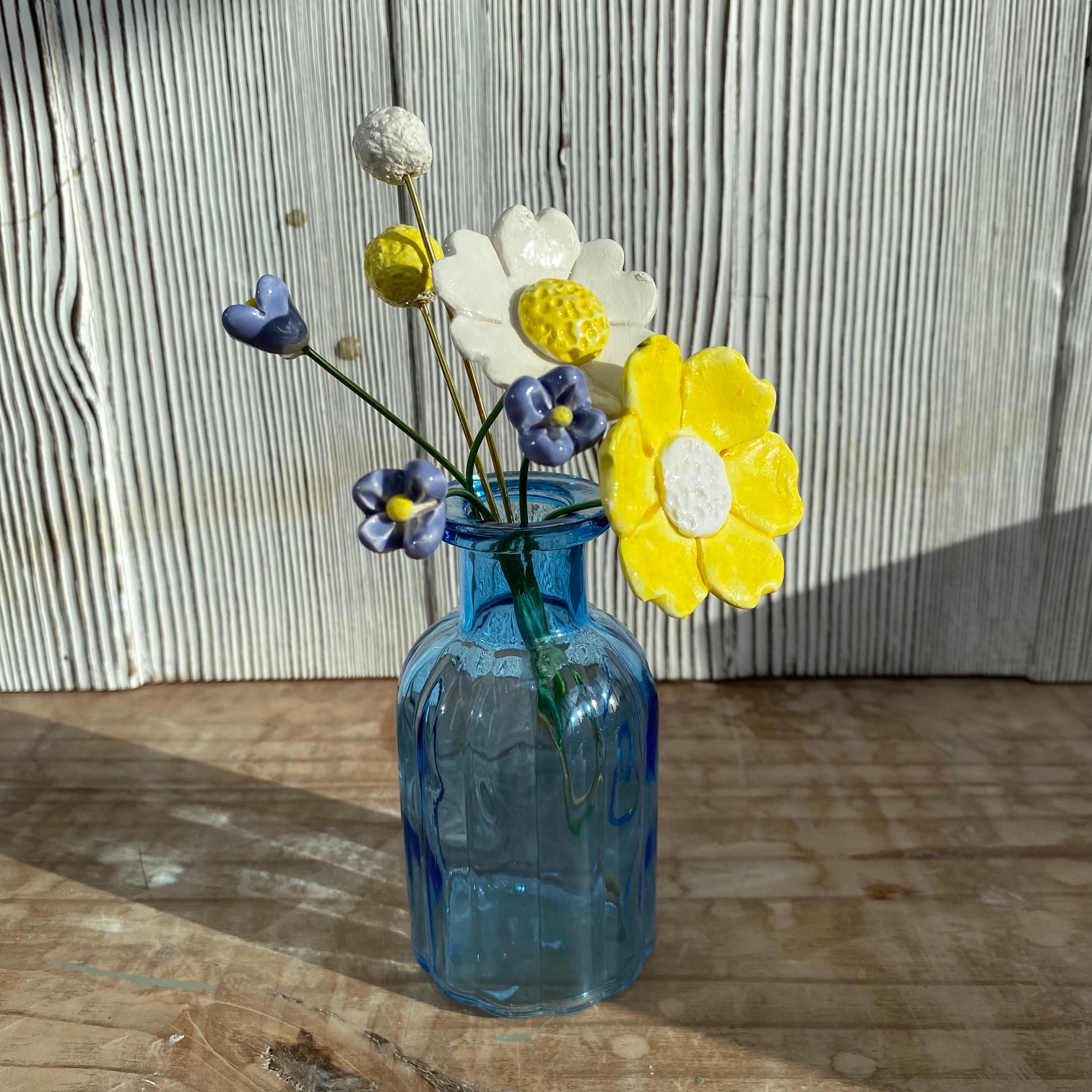ceramic flowers in a vase